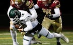 Lakeville South's Riley Mahlman (86) sacks Mounds View&#x2019;s Cole Stenstrom (16) for a big loss in Friday night&#x2019;s Class 6A quarterfinal in E