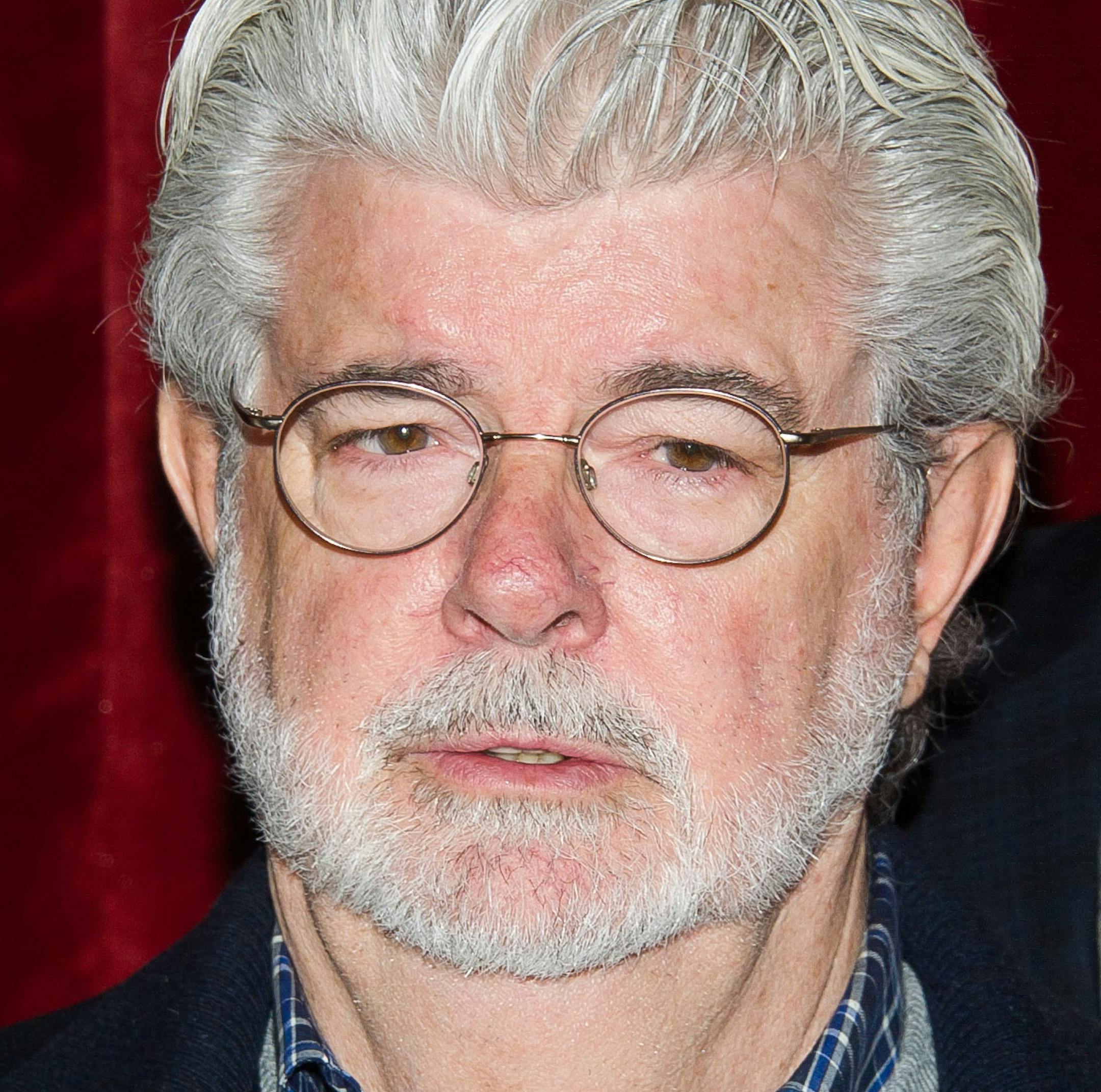 FILE - In this Saturday, Jan. 17, 2015 file photo, George Lucas attends a special screening of "Strange Magic" hosted by The Cinema Society and Lucasfilm in New York. Lena Dunham, Mindy Kaling, Kristin Wiig, Robert Redford and Lucas are among the stars participating in the Sundance Institute&#xed;s new &#xec;Power of Story&#xee; programs set to stream live online. The 2015 Sundance Film Festival runs Jan. 22 through Feb. 1, 2015. (Photo by Charles Sykes/Invision/AP, File)