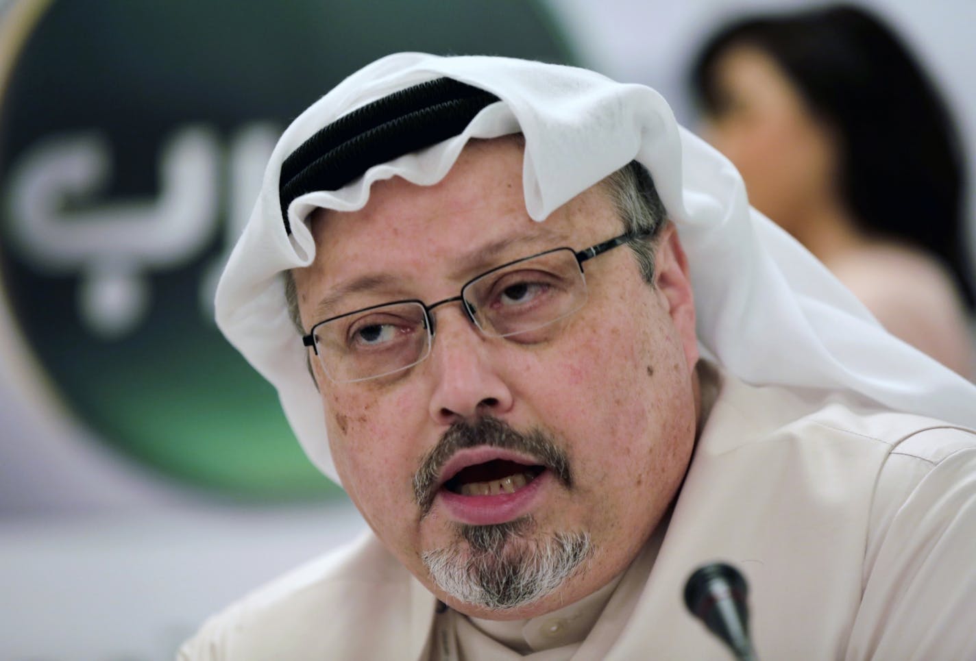 FILE - In this Dec. 15, 2014, file photo, Saudi journalist Jamal Khashoggi speaks during a press conference in Manama, Bahrain. Nearly one year has passed since the Oct. 2 killing of Khashoggi, whose body has still not been found, no one has been convicted and questions continue to linger over the crown prince's culpability. At the sidelines of the U.N. General Assembly, relatives of activists detained in Saudi Arabia, and Khashoggi's fiancée, wondered why those responsible haven't been punished