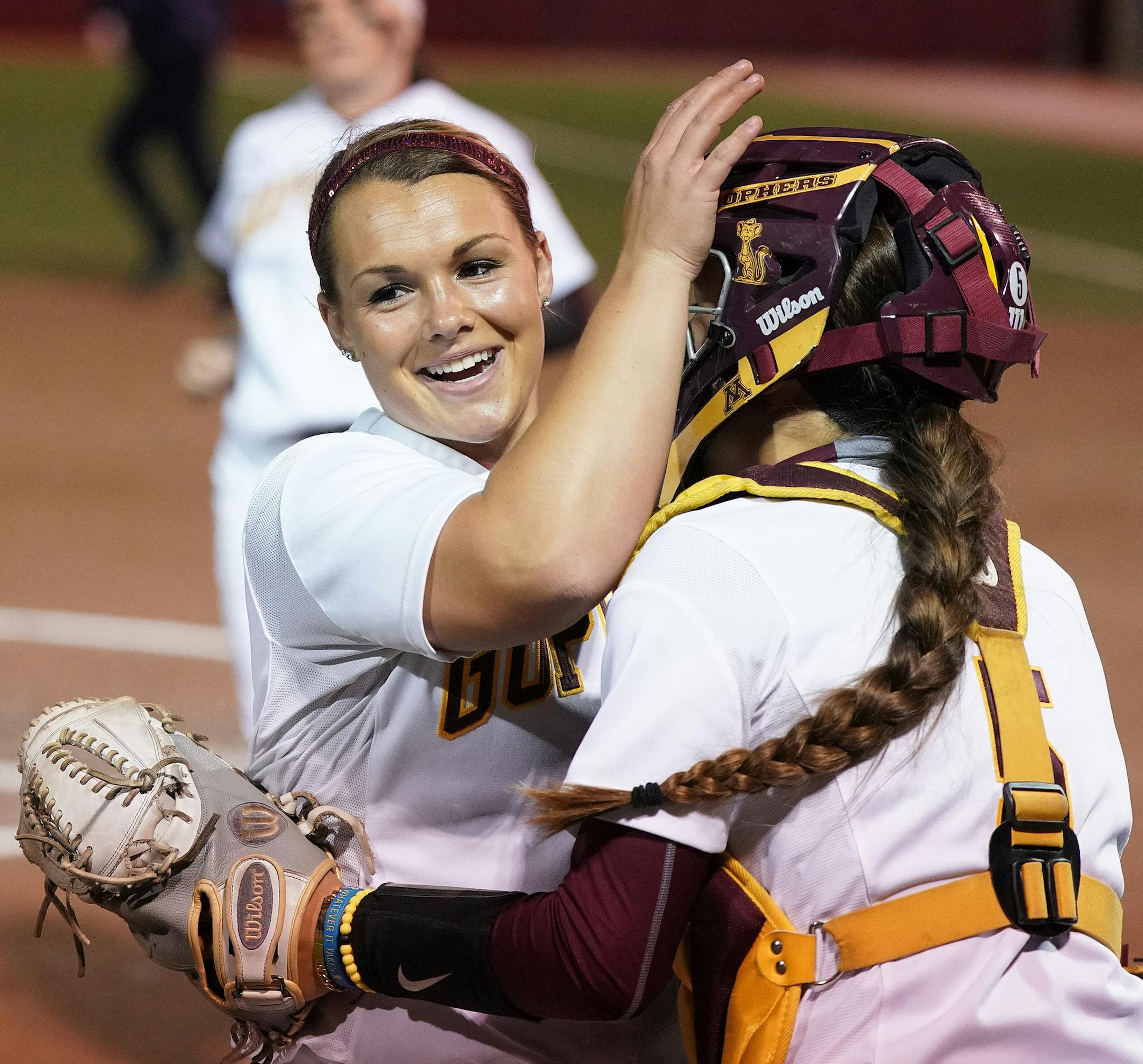 Gophers pitcher Amber Fiser (13) was congratulated by catcher Emma Burns (5) after getting three outs Friday night. ] ANTHONY SOUFFLE • anthony.souffle@startribune.com The University of Minnesota Gophers played the North Dakota State University Bison in an NCAA regional game Friday, May 17, 2019 at Jane Sage Cowles Stadium in Minneapolis.