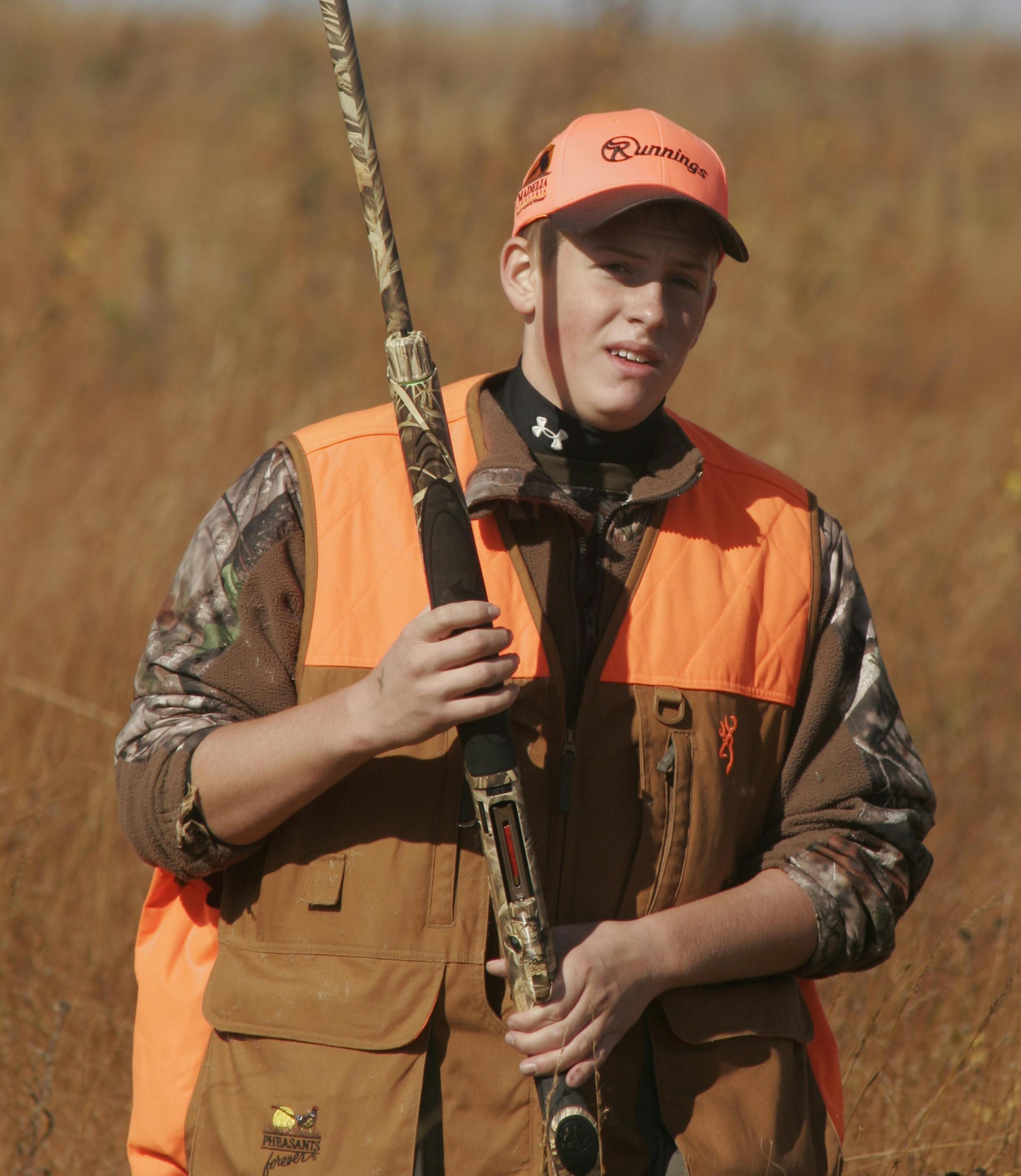 Doug Smith/Star Tribune; Oct. 12, 2013, near Madelia, Mn. BlairJilek, 14, of Lester Pairie, Minn., hunted pheasants Saturday near Madelia. He was one of eight high school students from the Minnesota High School Clay Target League iinvited to the Governor's Pheasant Opener.