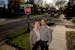 Christina Anderson-Taghioff and Simon Taghioff stood at the intersection of Victoria St. and Osceola Ave. in front of their home in St. Paul on May 7,