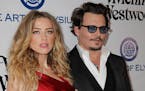 Actors Amber Heard and Johnny Depp attend a gala in January in Culver City, Calif.