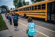 Children arrive for classes at Forest View Elementary in the summer of 2020. RICHARD TSONG-TAATARII ¥ richard.tsong-taatarii@startribune.com