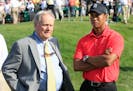 Jack Nicklaus, left, and Tiger Woods in 2012.