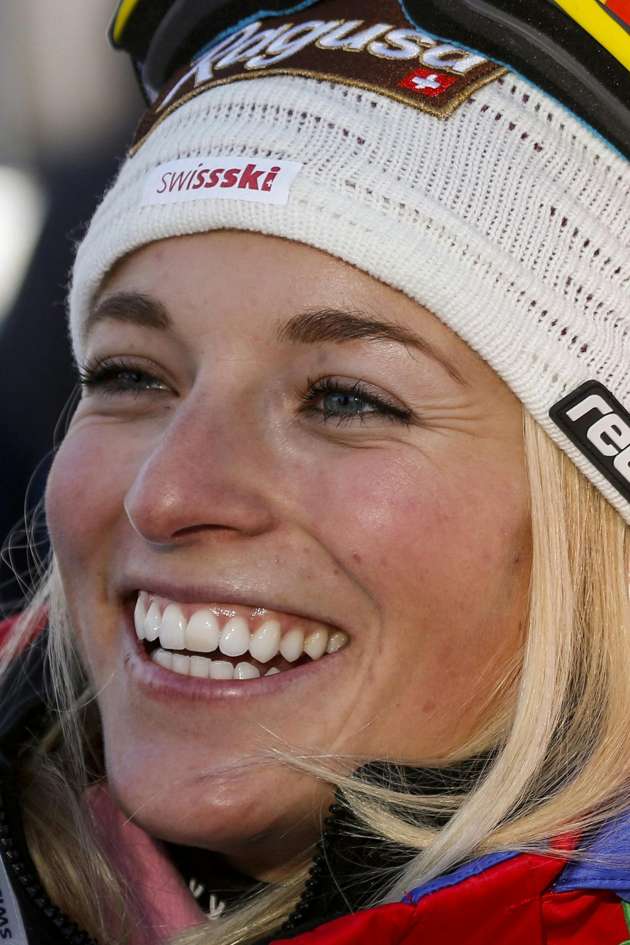 Switzerland's Lara Gut smiles during an interview after her first place finish in the women's World Cup Super-G ski race in Lake Louise, Alberta, Sunday, Dec. 7, 2014. (AP Photo/The Canadian Press, Jeff McIntosh)