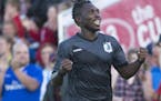 Minnesota United FC midfielder Kalif Alhassan (11) celebrated a goal by forward Pablo Campos (9) in the first half against Atlanta Saturday night. ] A