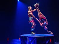 Canadian couple Myriam Lessard and Mathieu Cloutier perform a daring roller-skating act on a tiny round platform in "Bazzar," Cirque du Soleil's lates