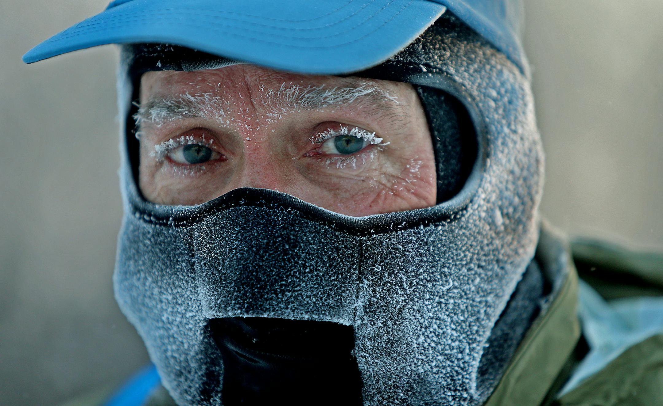 John Brower snow in his eye lashes after running to work in the frigid -20 weather Monday, Jan. 6, 2014 in Minneapolis. A whirlpool of frigid, dense air known as a "polar vortex" descended Monday into much of the U.S. (AP Photo/The Star Tribune, Elizabeth Flores) MANDATORY CREDIT; ST. PAUL PIONEER PRESS OUT; MAGS OUT; TWIN CITIES TV OUT ORG XMIT: MIN2014011014081632