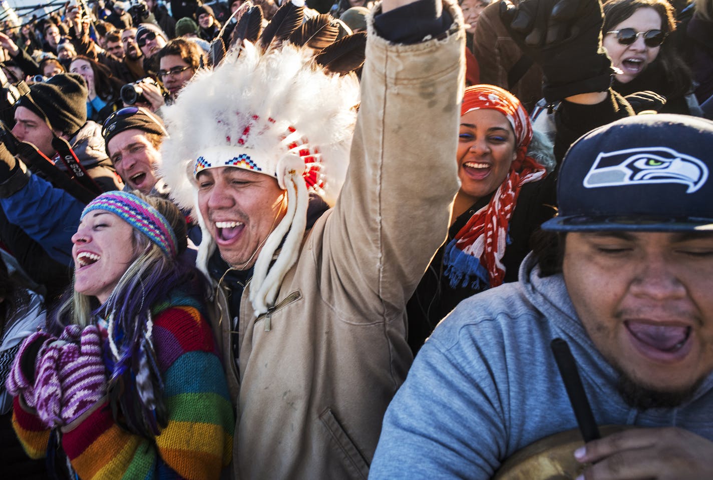 Katibunny Roberts and her husband, Lance King, of Kyle, S.D., celebrated the Army Corps' denial of an easement to bury a section of the Dakota Access pipeline under the Missouri River. King recently moved back to his ancestral Lakota homeland. He is a descendant of Chief Matthew King, Noble Redman. On the right is Lazaro Tinoco of the Lower Elwha Klallam Tribe in Washington. Richard Tsong-Taatarii/rtsong-taatarii@startribune