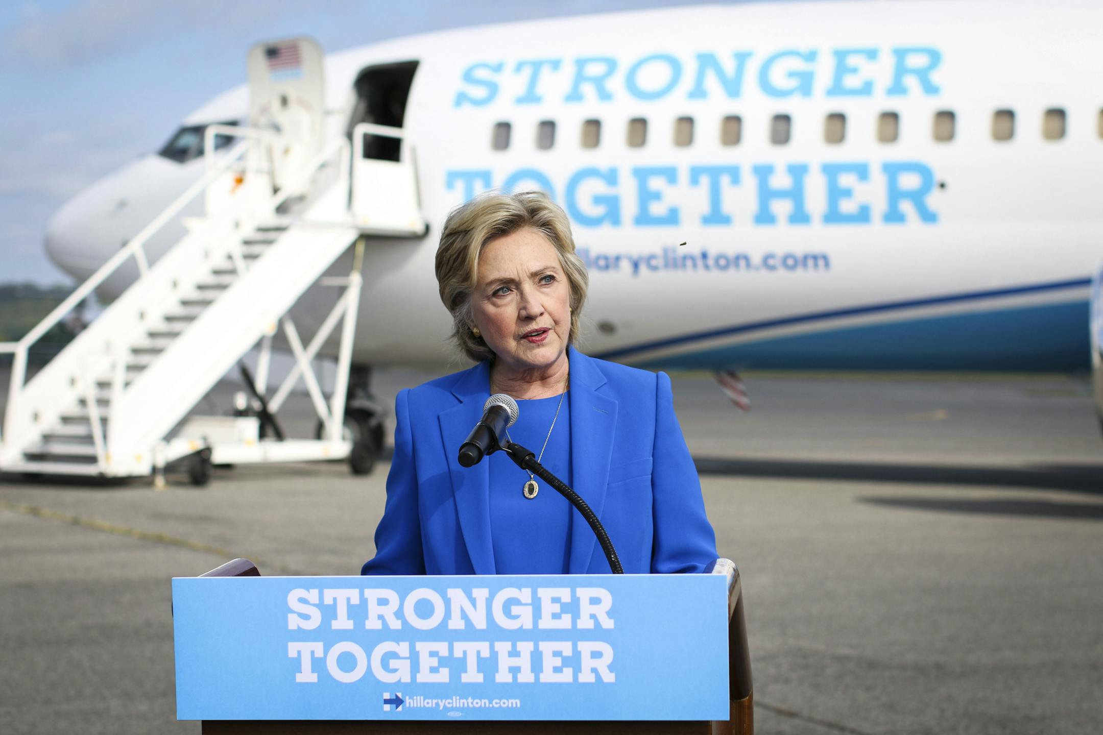 Democratic presidential candidate Hillary Clinton answers questions from reporters near her campaign plane in White Plains, New York, Sept. 8, 2016. (Doug Mills/The New York Times)