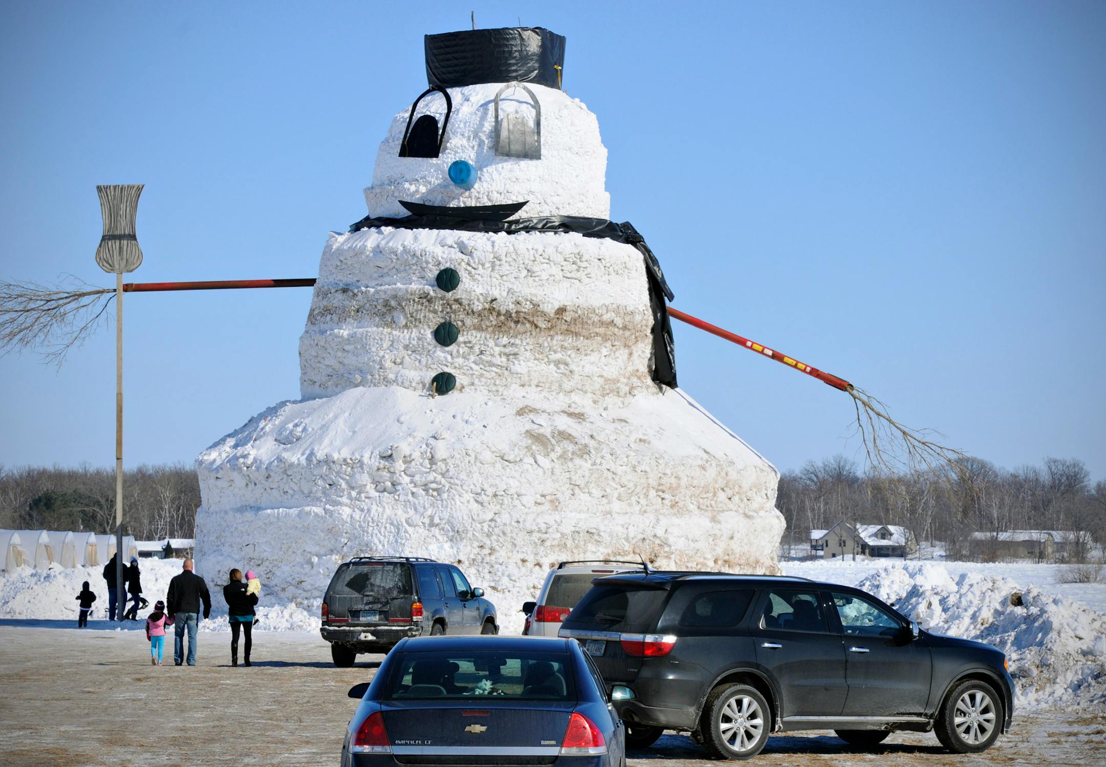 Greg Novak of Gilman, Minn., says he invested hundreds of hours to build a 50-foot snowman named "Granddaddy" that he hopes will wake onlookers from their winter doldrums. And he admits it has some neighbors questioning his sanity.