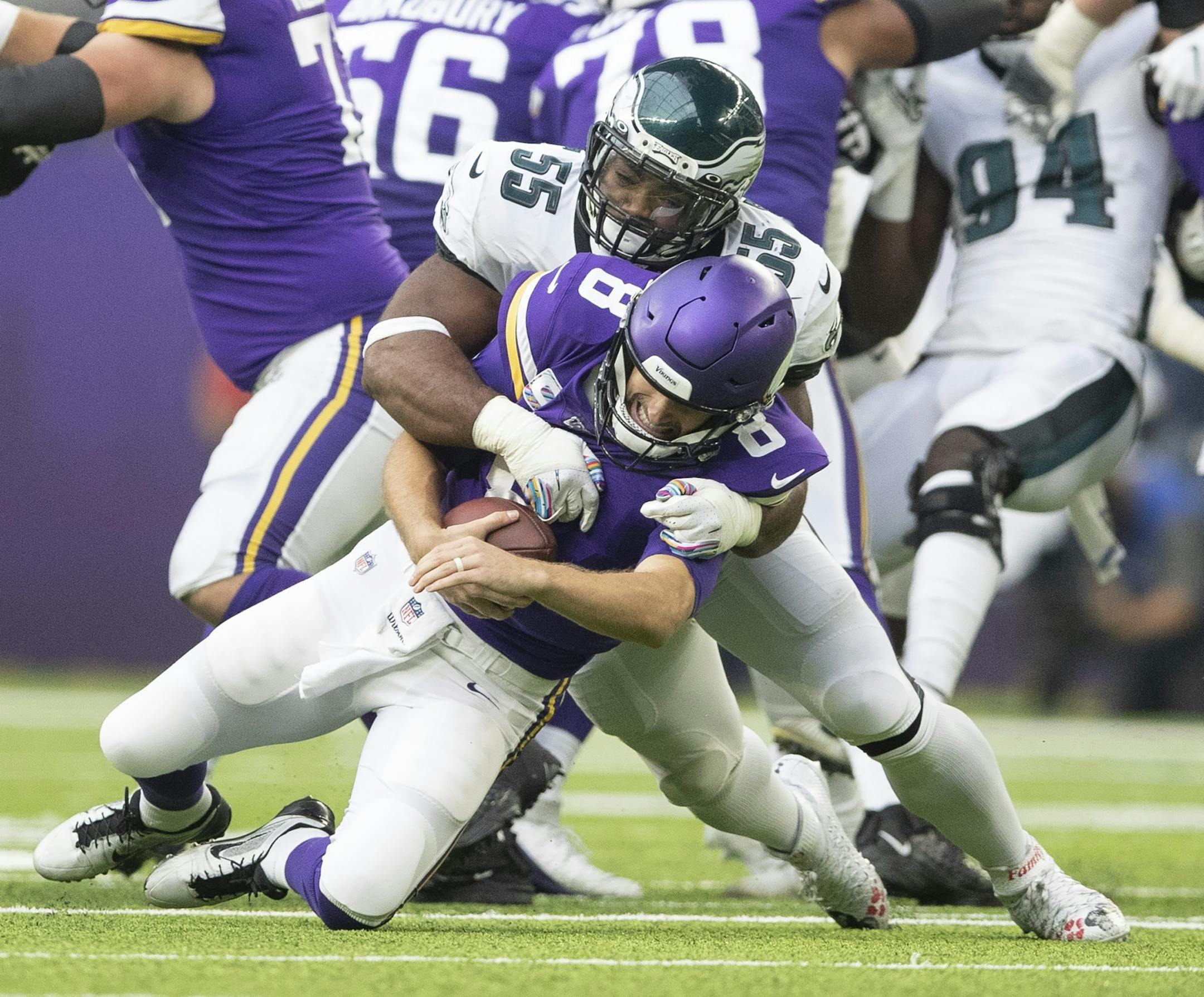 Philadelphia Eagles defensive end Brandon Graham (55) sacked Minnesota Vikings quarterback Kirk Cousins (8) for an 8 yard loss in the second quarter at U.S. Bank Stadium.