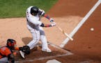Nelson Cruz's RBI double in the third inning Tuesday was one of the few offensive bright spots for the Twins against the Astros in Game 1 of the teams