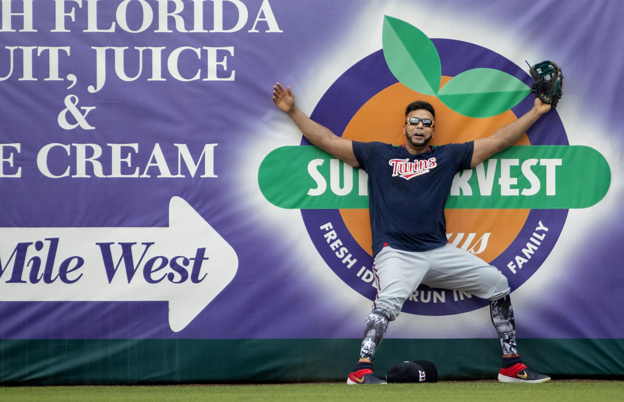 Minnesota Twins' Nelson Cruz hit the wall while chasing a fly ball during practice. ] CARLOS GONZALEZ • cgonzalez@startribune.com – Fort Myers, FL – February 19, 2020, CenturyLink Sports Complex, Hammond Stadium, Minnesota Twins, Spring Training