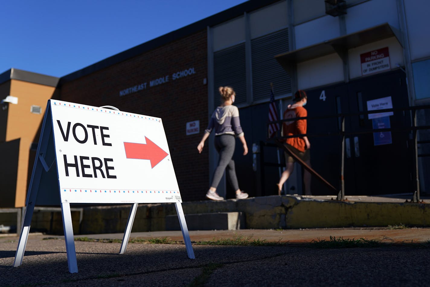 Voters arrived to cast their ballots Tuesday morning at Northeast Middle School in Minneapolis.