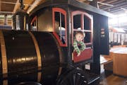 Jacob Steele, 2, of New Brighton plays on the train exhibits at the Jackson Street Roundhouse in St. Paul on April 5, 2014. ] Photo by Leslie Plesser 