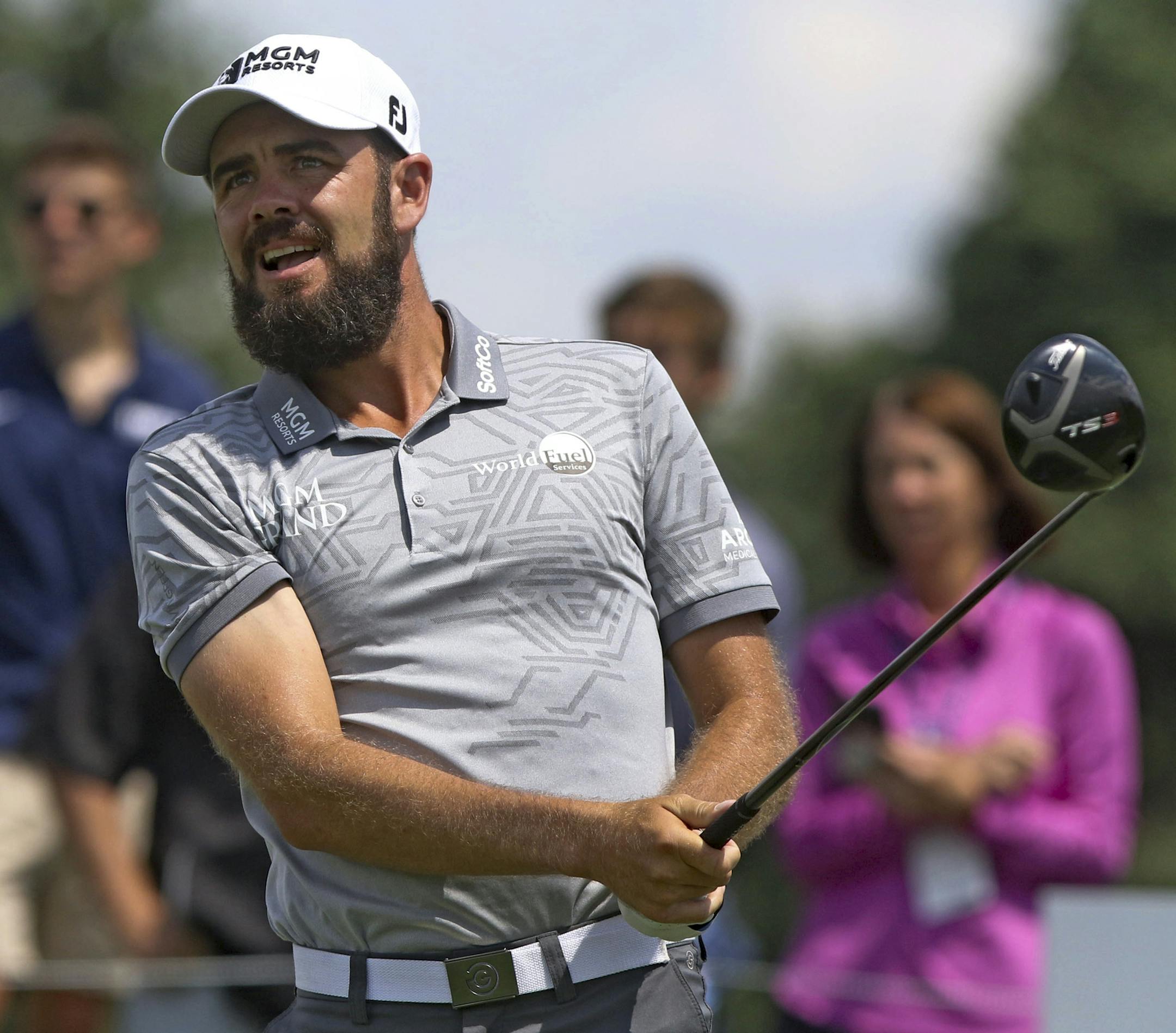 Troy Merritt watches his drive off the fifth tee during the Northern Trust golf tournament, Friday, Aug. 9, 2019, at Liberty National Golf Club in Jersey City, N.J. (Chris Pedota/The Record via AP)