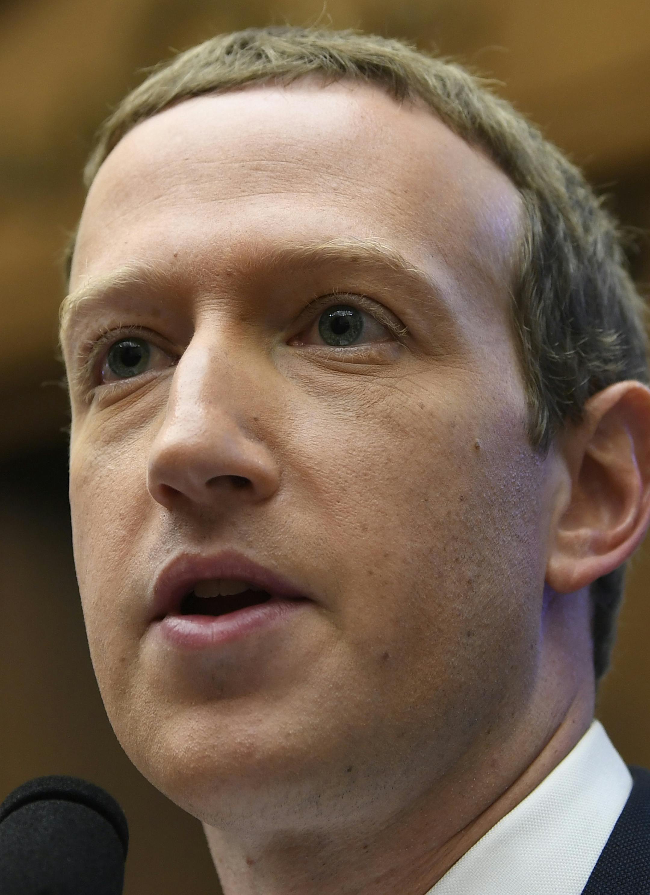 Facebook Chief Executive Officer Mark Zuckerberg testifies before the House Financial Services Committee on Capitol Hill in Washington, Wednesday, Oct. 23, 2019, to discuss his plans for the new cryptocurrency Libra. (AP Photo/Susan Walsh) ORG XMIT: DCSW112