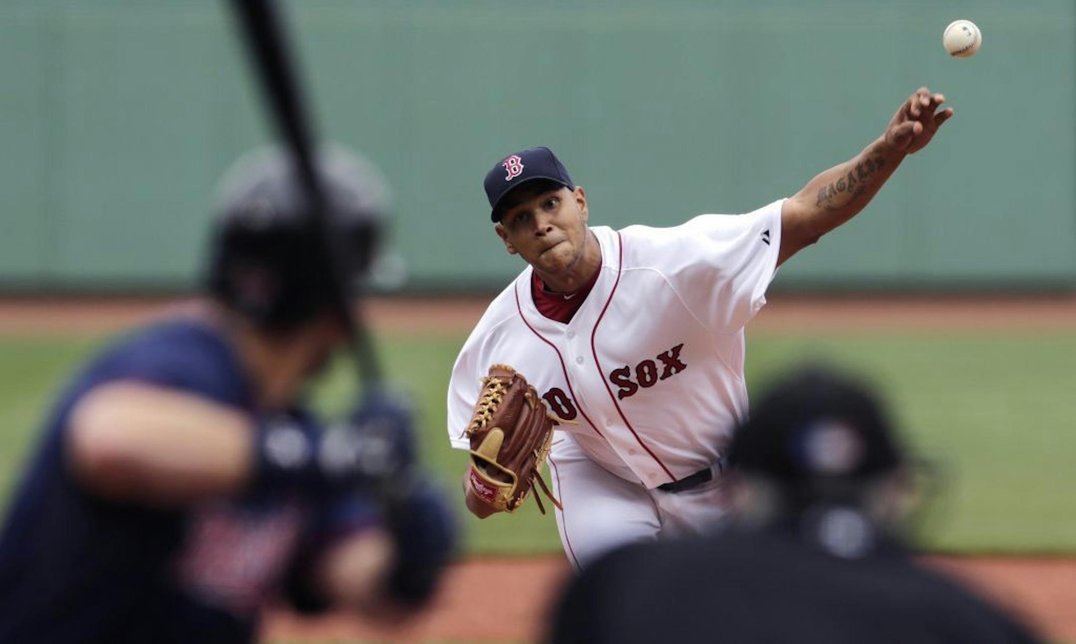 Boston Red Sox starting pitcher Eduardo Rodriguez delivers against the Minnesota Twins during the first inning in the first baseball game of a doubleheader at Fenway Park in Boston, Wednesday, June 3, 2015.