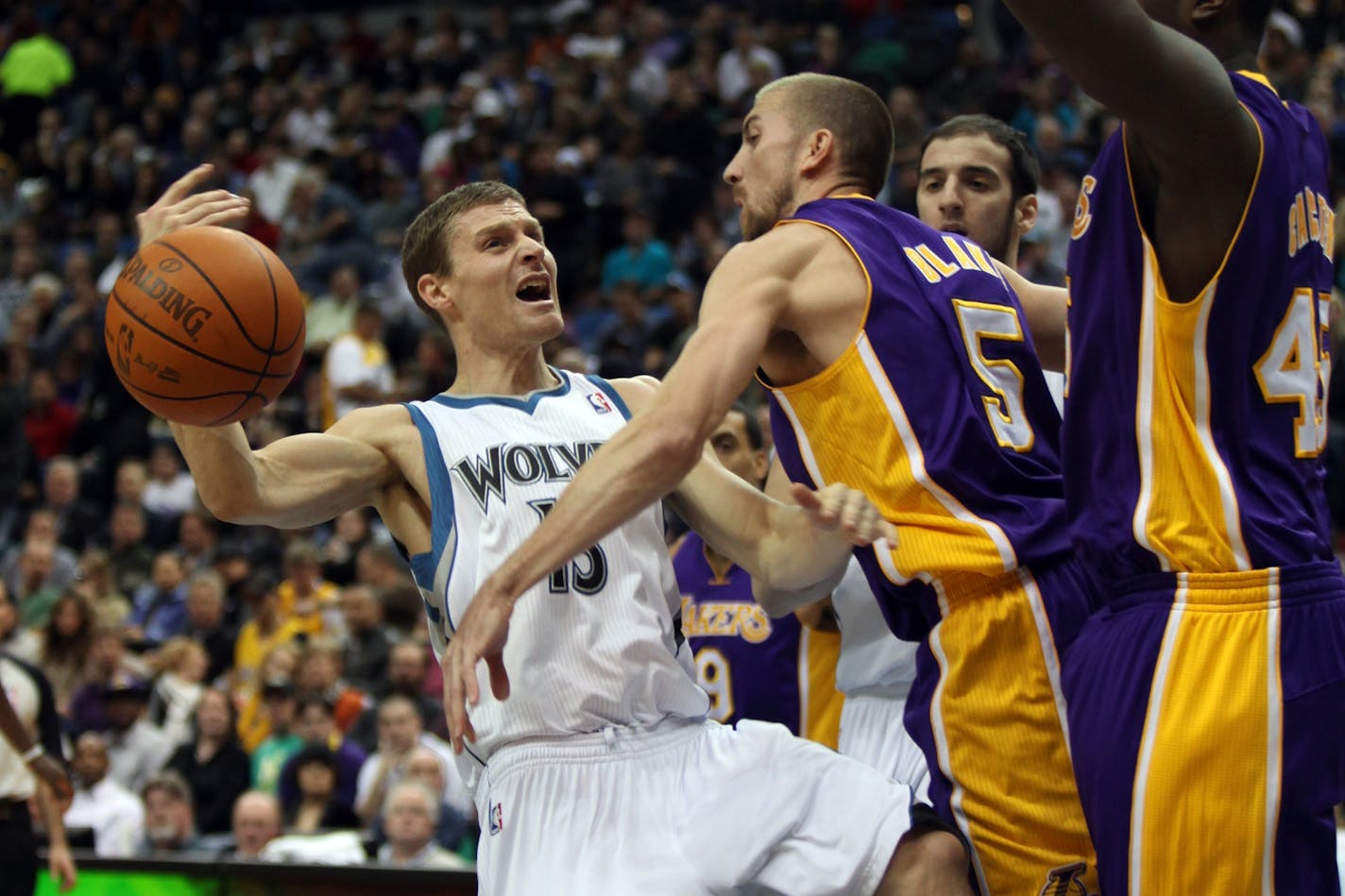 Wolves Luke Ridnour got fouled on his way to the hoop by Laker Steve Blake during first half action.