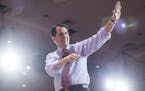 Wisconsin Gov. Scott Walker walks off the stage after speaking during the Conservative Political Action Conference in National Harbor, Md., Feb. 26, 2