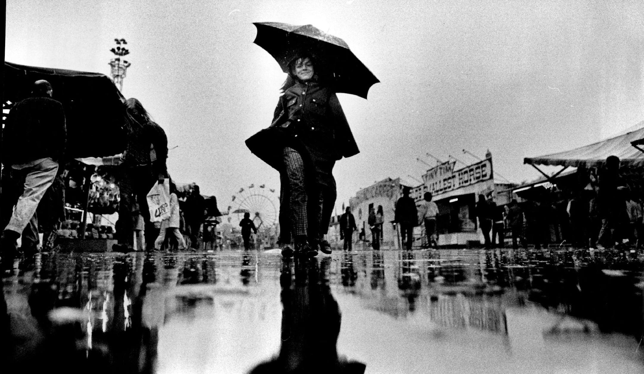 September 1, 1971 Some visitors to the Minnesota State Fair carried umbrellas Tuesday, and the Midway was relatively quiet with most of the rides closed. Nevertheless, about 65,000 foul-weather fans attended yesterday. August 31, 1971 Richard Olsenius, Minneapolis Star Tribune