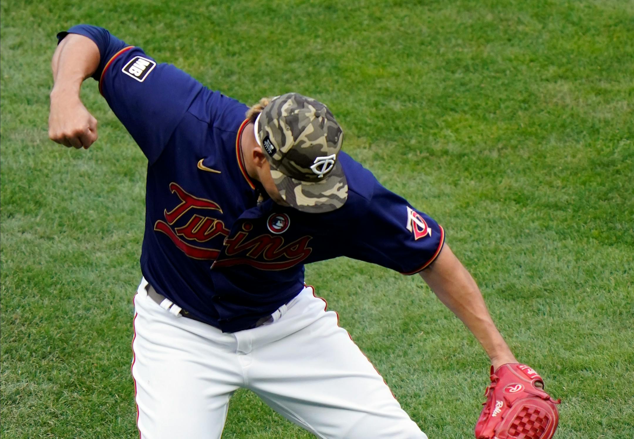 Minnesota Twins' relief pitcher Hansel Robles celebrates the final out as his team defeats the Oakland Athletic in baseball game, Saturday, May 15, 2021, in Minneapolis. (AP Photo/Jim Mone)