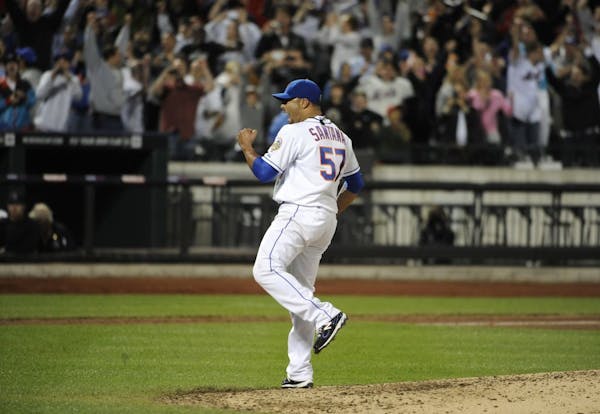 Johan Santana struck out St. Louis' David Freese for the final out in the first no-hitter in Mets history.