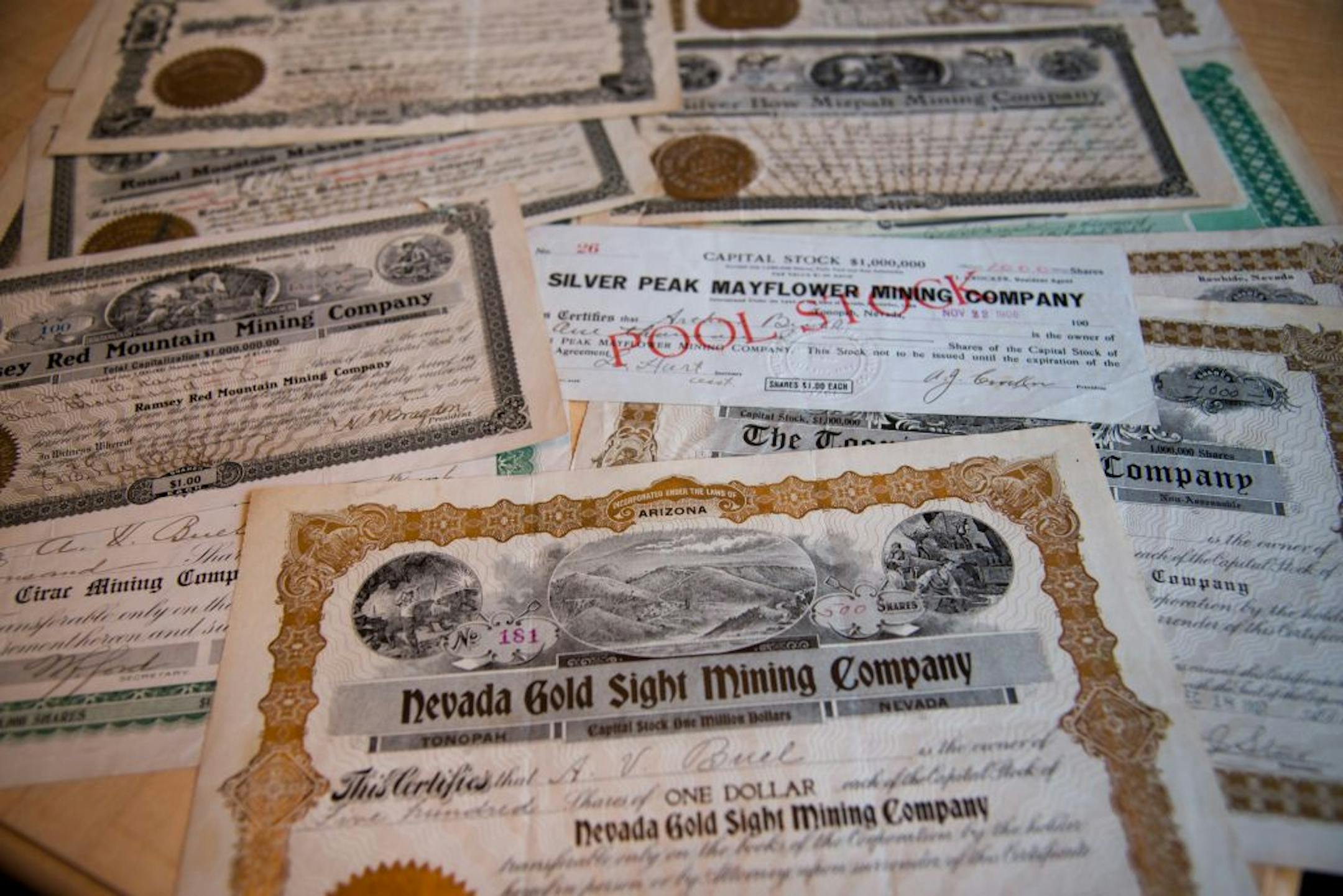 Dick Brothers shows the paper stock certificates he owns that date back to the 1920s. Most are from old silver and gold mining companies with the stock being purchased by Brothers' grandfather in Alaskan and California mining towns.The paper stock certificate is rapidly becoming a piece of a bygone era.