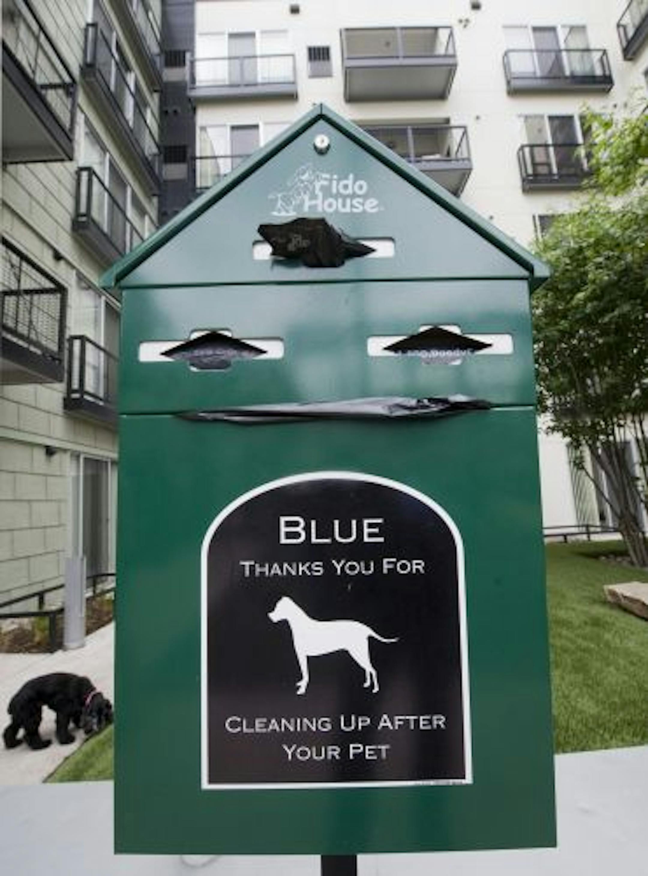 Little baggies are supplied for dog owners in the dog park behind the Blue apartments in Minneapolis.