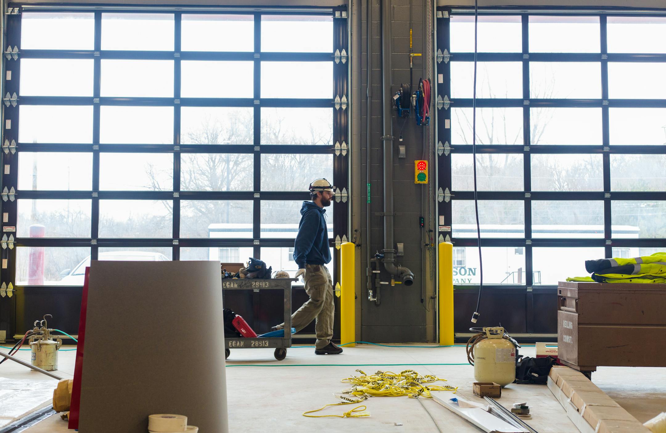 A construction worker walks in the open space of the unfinished Bayport fire station, Feb. 17. ] Elizabeth Brumley special to the Star Tribune The new station projected to be completed Feb. 27.