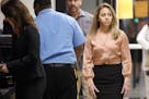 Fired Dallas police Officer Amber Guyger, right, arrived for jury selection on Sept. 13 in her murder trial at the Frank Crowley Courthouse in downtow