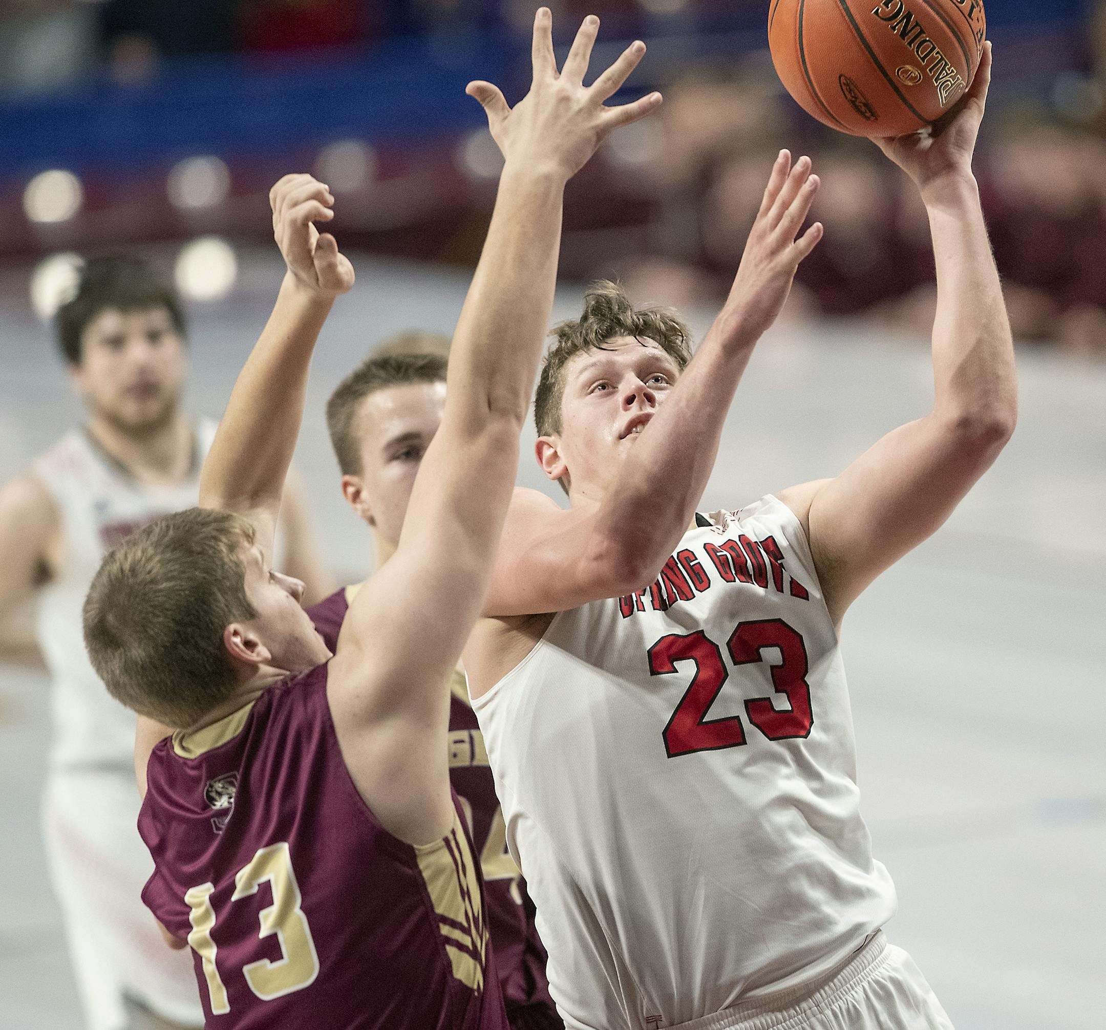 Spring Grove's Ethan Matzke went up for two despite defensive efforts from Springfield's Ivan Hovland during the second period of their matchup in the boys' basketball state tournament 1A quarterfinals, Thursday, March 21, 2019 at Williams Arena in Minneapolis, MN. ] ELIZABETH FLORES &#x2022; liz.flores@startribune.com
