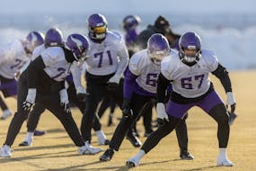 Vikings guard Ed Ingram (67) and other offensive linemen took to the field for an outdoor practice at TCO Performance Center in Eagan on Jan. 5.
