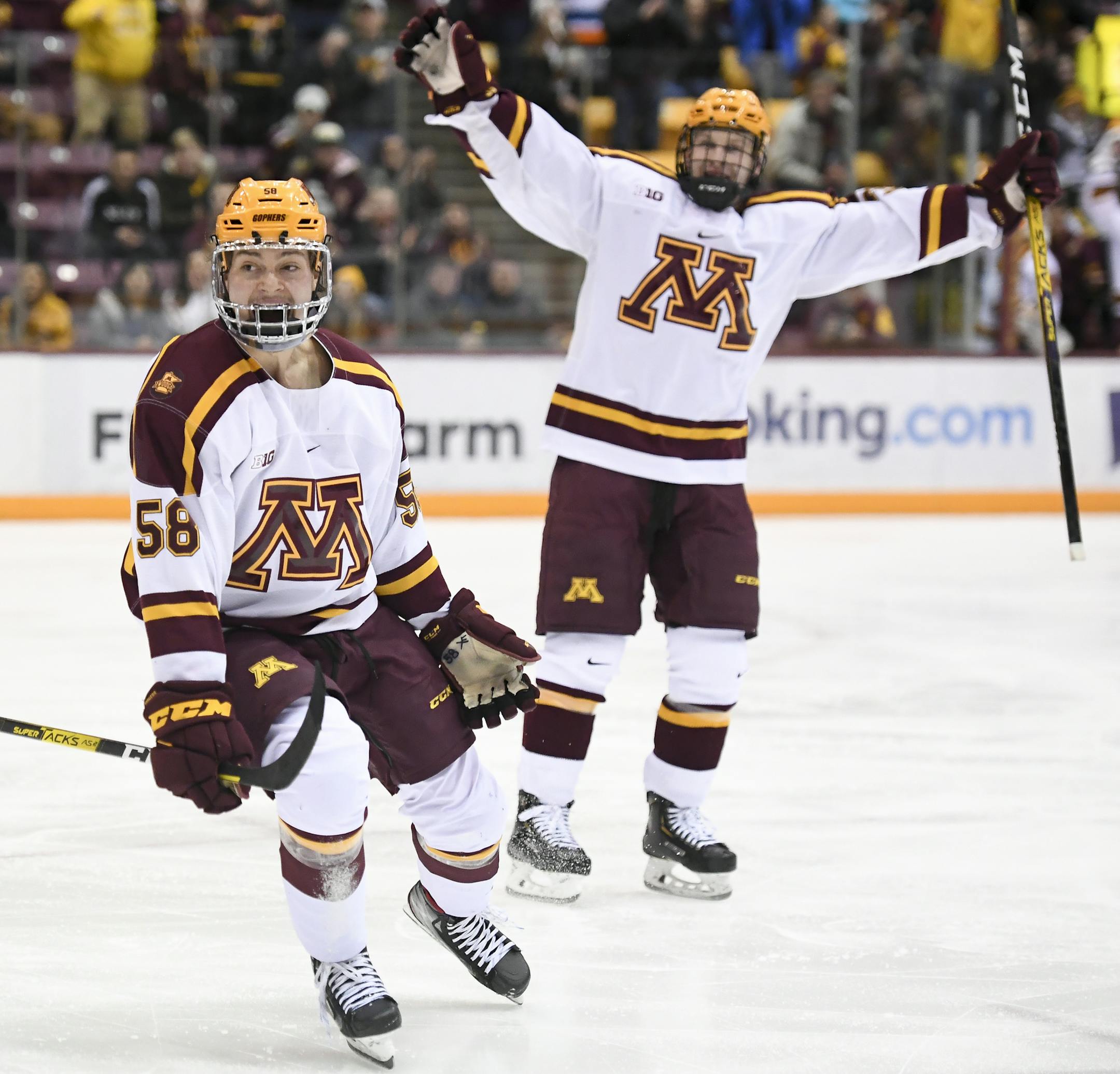 Gophers forward Sampo Ranta celebrated his second period goal with forward Ben Meyers, right, against Michigan State.