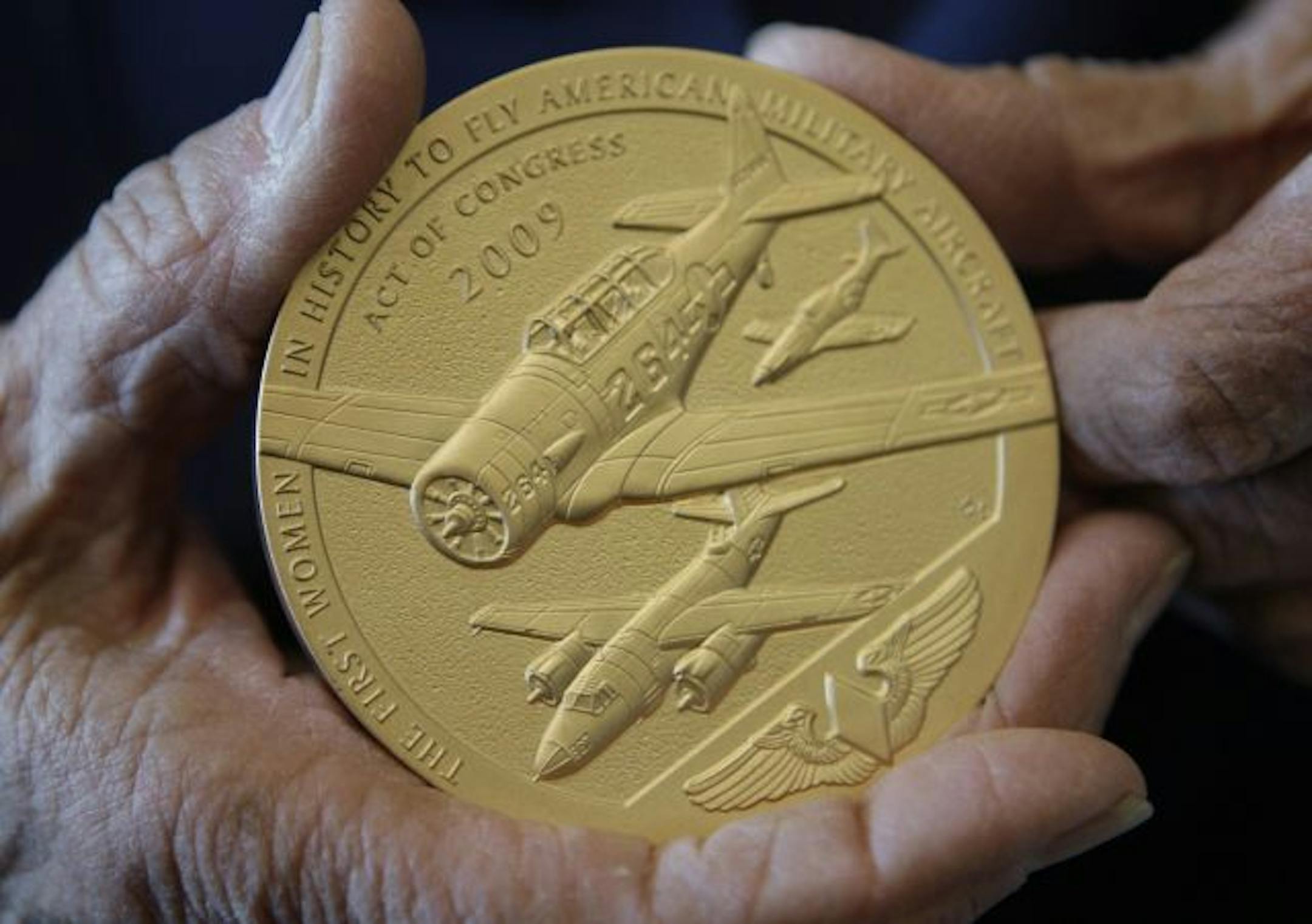 Beverly Beesemyer of Beverly Hills, Calif., held her new Congressional Gold Medal.