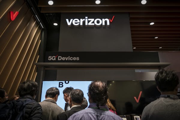 Verizon launched 5G network coverage in limited parts of Minneapolis and Chicago last week. File photo of Verizon's display of 5G-capable smartphones 