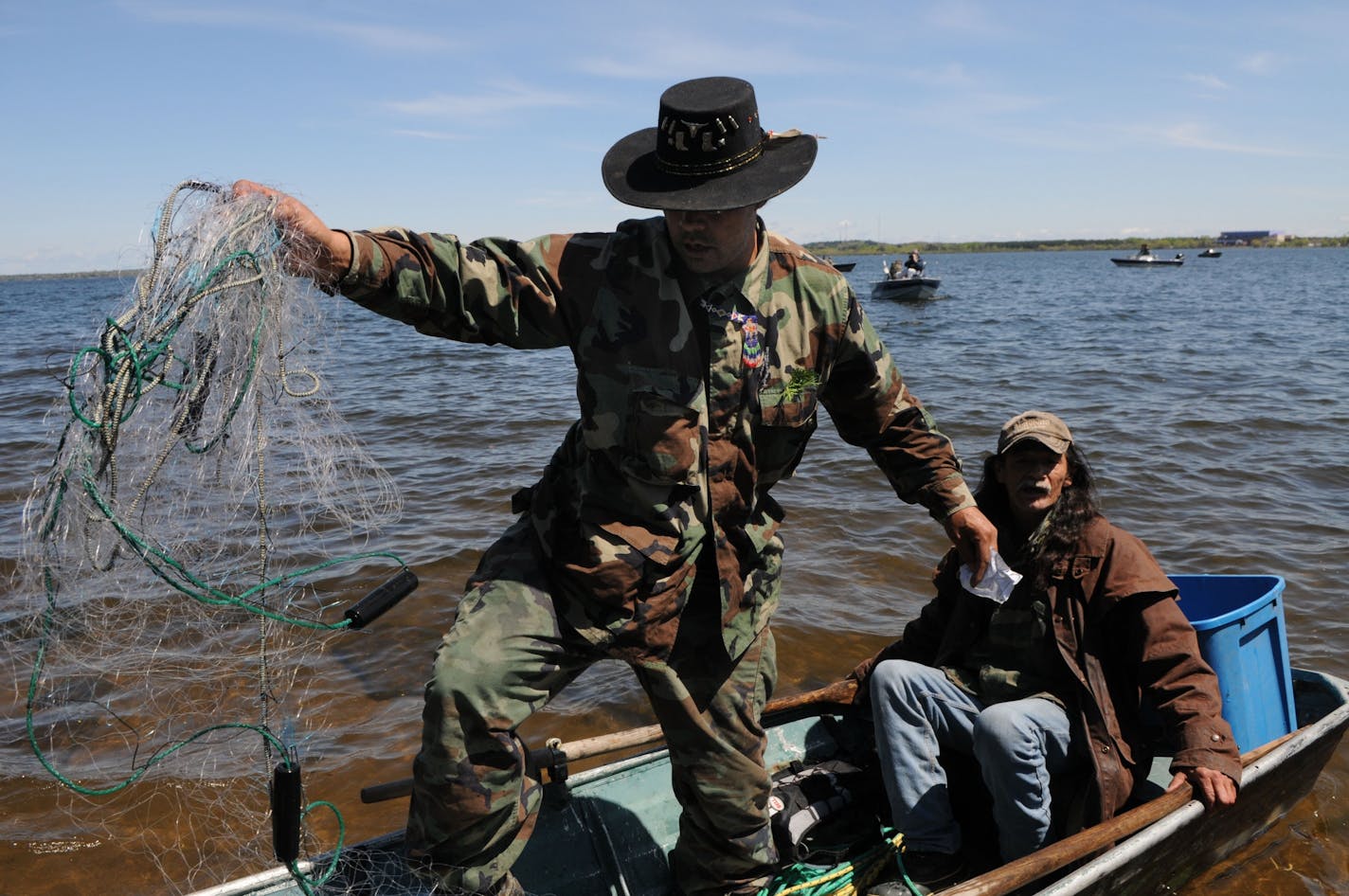 Bemidji, Mn Friday 5/14/10 An off-reservation treaty rights battle began Friday on Lake Bemidji, and could ultimately could engulf much of northern Minnesota. Some Leech Lake Chippewa band members set nets in Lake Bemidji the day before Minnesota's walleye and northern pike seasons begins Minnesota DNR officials confiscated several nets and and fish. Aaron Smith returns to shore with what was left of his net, after the Minnesota DNR cut his fishing nets