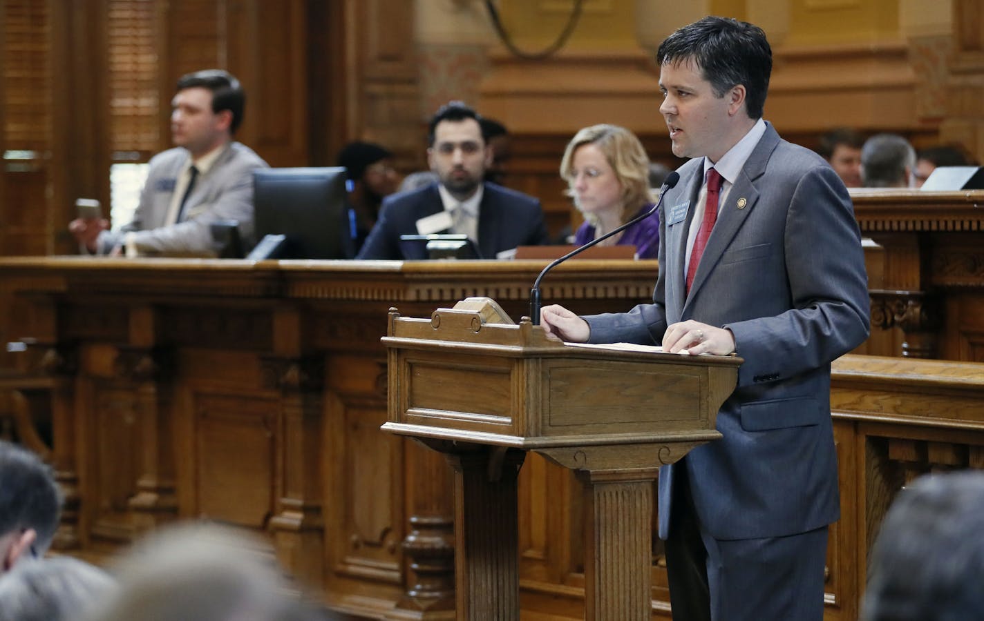 Senator P. K. Martin, R - Lawrenceville, presents HB 918, which stripped a jet-fuel tax break. The Georgia Senate approved a sweeping tax bill Thursday, March 1, 2018, in Atlanta that punishes Delta Air Lines for cutting business ties with the National Rifle Association. The measure passed the GOP-dominated Senate 44-10, with only Democrats opposed. (Bob Andres/Atlanta Journal-Constitution via AP)