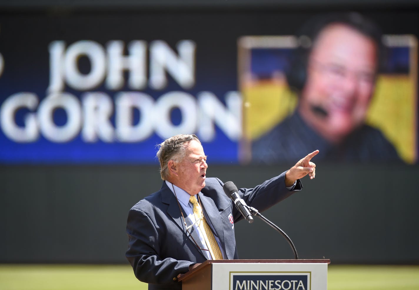 Former Minnesota Twins announcer John Gordon speaks after being inducted into the Minnesota Twins Hall of Fame before the Twins game against the Cleveland Indians Sunday, July 17, 2016, in Minneapolis. (AP Photo/Craig Lassig)