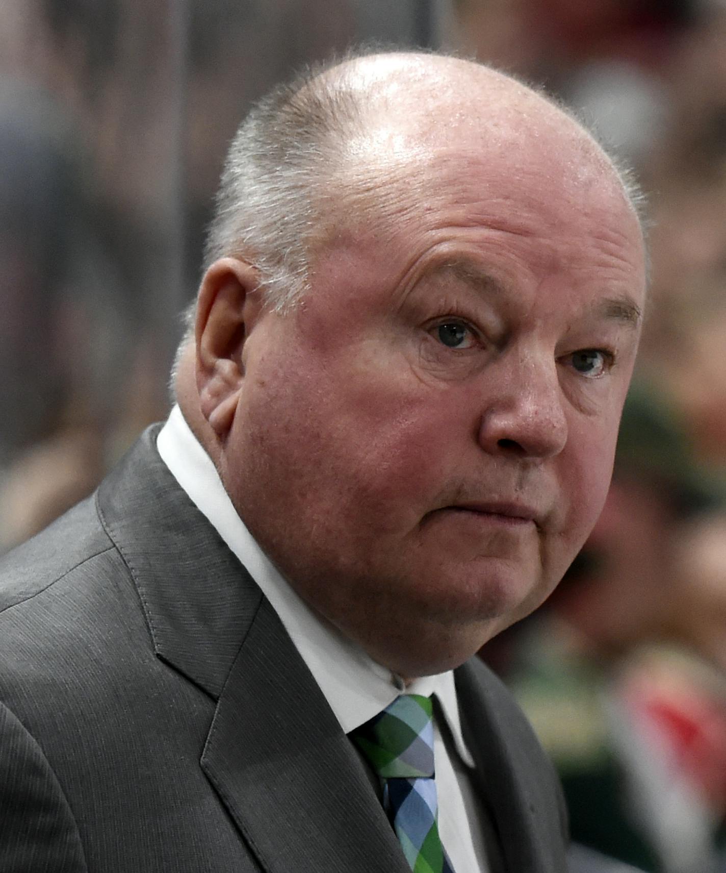 Minnesota Wild head coach Bruce Boudreau watches his team play against the San Jose Sharks during the second period of an NHL hockey game Sunday, March 5, 2017, in St. Paul, Minn. (AP Photo/Hannah Foslien)