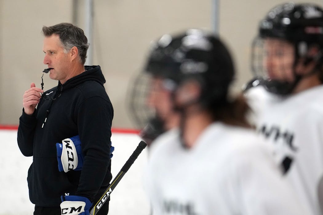 Newly named PWHL Minnesota head coach Ken Klee watched over his players during a recent practice.