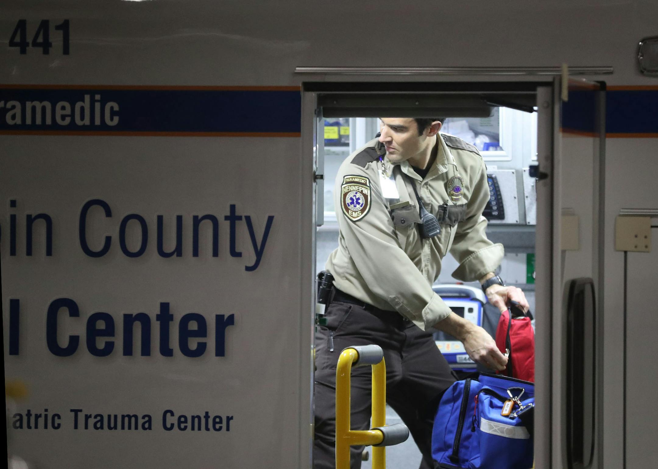 An HCMC paramedic prepares an ambulance for service as HCMC prepped area media members on operations leading up to and during the Super Bowl Friday, Jan. 5, 2017, at HCMC in Minneapolis, MN. ] DAVID JOLES &#xef; david.joles@startribune.com HCMC doctors and officials talk about the Super Bowl, ambulances, emergency care and frostbite. With the hospital just steps away from the stadium, how will patients and those needing emergency care be affected?**,,cq