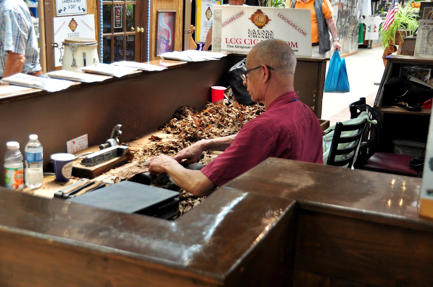 A man rolls cigars at the Arthur Avenue Market in the Bronx section of New York City. Photo by Stacy Brooks, special to the Star Tribune