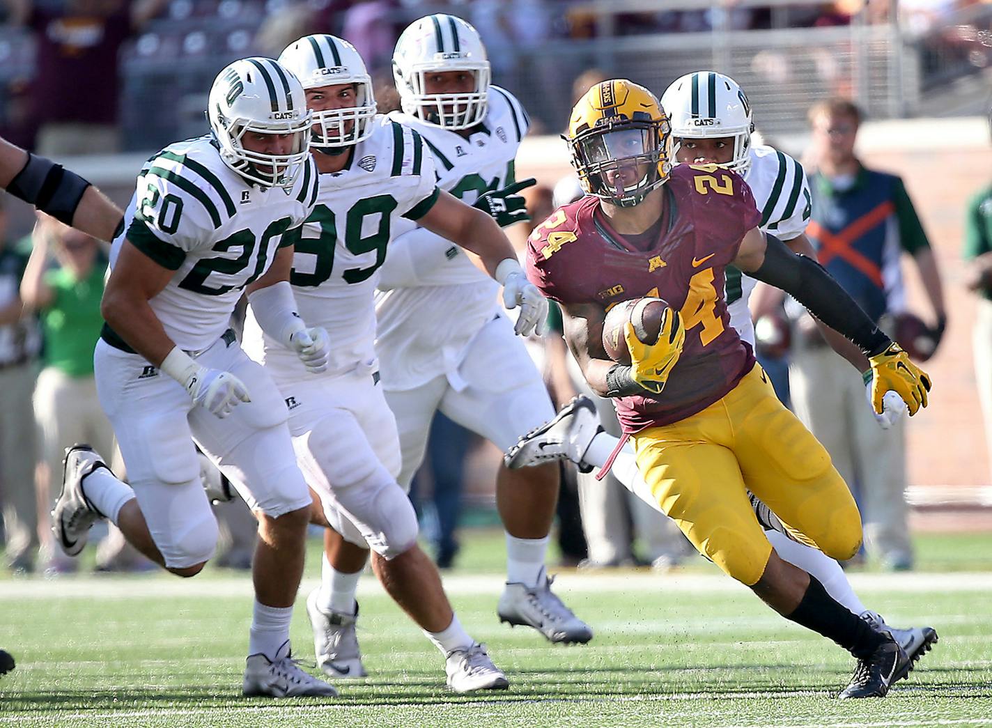 Minnesota running back Rodney Smith (24) picks up yardage in the third quarter against Ohio at TCF Bank Stadium in Minneapolis on Saturday, Sept. 26, 2015. Minnesota won, 27-24. (Elizabeth Flores/Minneapolis Star Tribune/TNS) ORG XMIT: 1174369