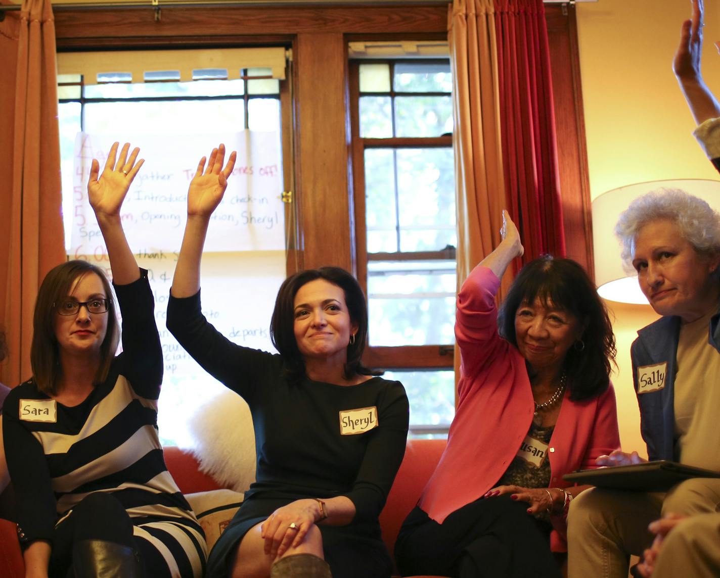 Sheryl Sandberg, CEO of Facebook and author of the bestseller Lean In: Women, Work, and the Will to Lead, dropped in on one of the Lean In Circles she inspired in the home of Linda Brandt in Minneapolis Tuesday night, October 1, 2013. During her remarks to the women at the Lean In Circle Tuesday night, Sheryl Sandberg, center, asked them to raise their hands if they'd ever been told they were "too agressive" at work. She said it was the adult version of girls being told they were "too bossy" rat