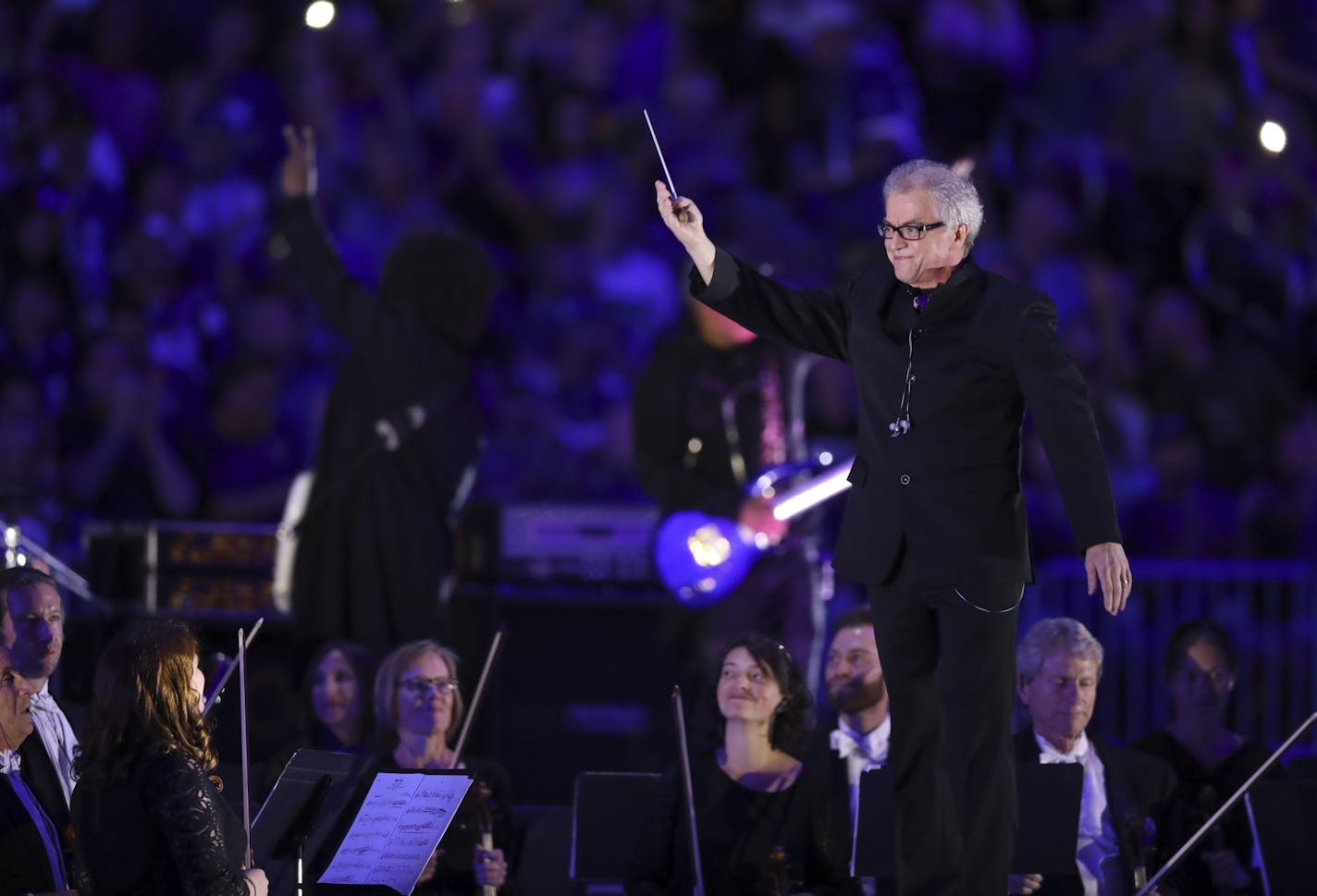 Minnesota Orchestra Music Director Osmo Vanska acknowledged the crowd's applause after the band's performance of an excerpt from Beethoven's Fifth Symphony followed by Prince's Purple Rain.