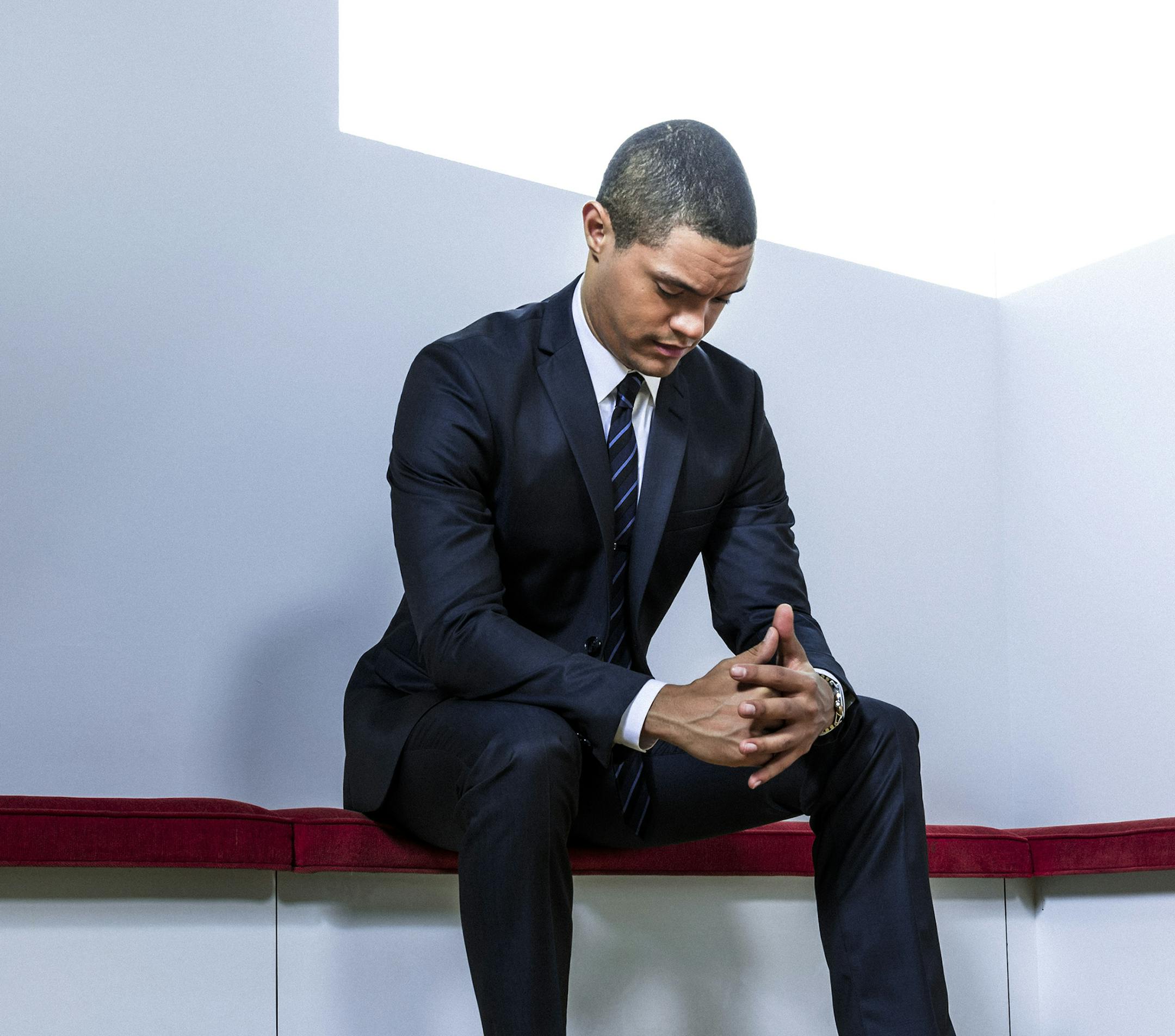 PHOTO MOVED IN ADVANCE AND NOT FOR USE - ONLINE OR IN PRINT - BEFORE SEPT. 27, 2015. -- Trevor Noah, who is replacing Jon Stewart as host of "The Daily Show," at the series' offices in New York, Sept. 16, 2015. Noah, who was born and raised in apartheid-era South Africa by a black mother and a white father, built an international reputation as a standup comedian before the handful of “Daily Show” appearances that preceded the surprising announcement that Comedy Central had chosen h