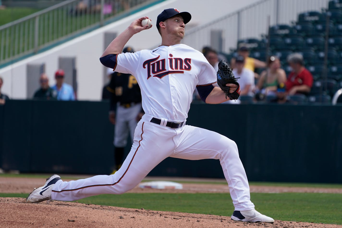 Minnesota Twins starting pitcher Josh Winder (74) delivers a pitch in the third inning during a spring training baseball game against the Pittsburg Pirates at the Hammond Stadium Wednesday March 30,2022, in Fort Myers, Fla. (AP Photo/Steve Helber)